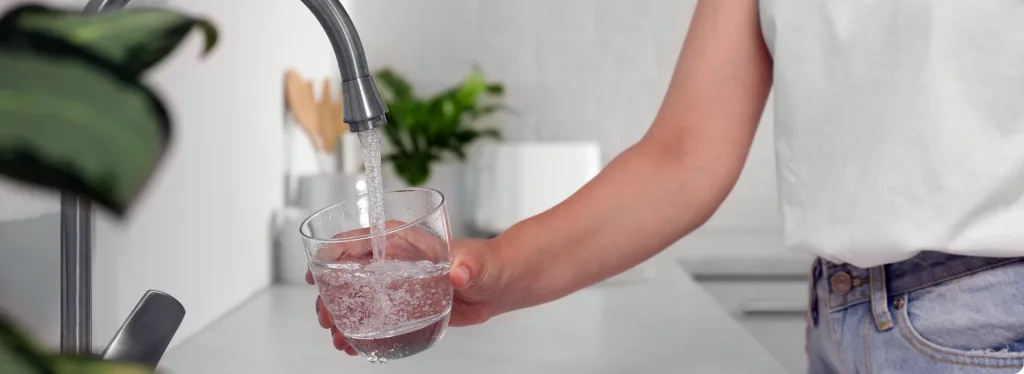 Crystal Water technician installing a reverse osmosis water system
